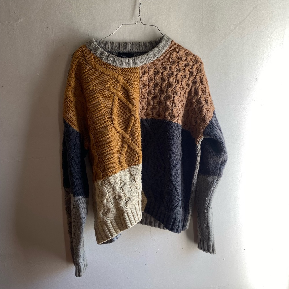 Cliché multicolored sweater.